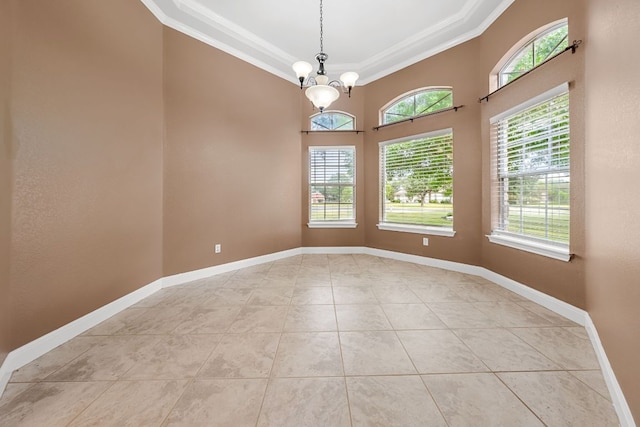 110 Starlight Trl, Georgetown, TX 78633 - empty room with ornamental molding, plenty of natural light, light tile patterned flooring, a chandelier, and a high ceiling