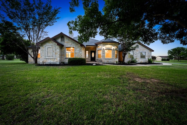 110 Starlight Trl, Georgetown, TX 78633 - view of front of home featuring stone siding and a front lawn