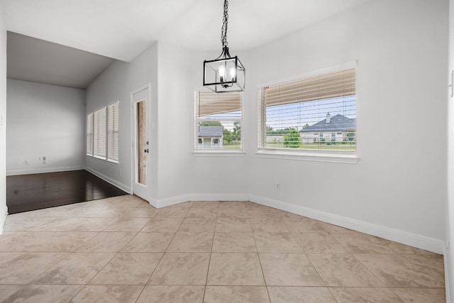110 Starlight Trl, Georgetown, TX 78633 - unfurnished dining area featuring plenty of natural light, a chandelier, and tile patterned floors