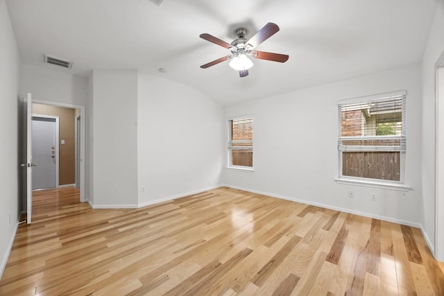 3817 Blue Mountain Path, Round Rock, TX 78681 - empty room with healthy amount of natural light, light wood-style flooring, ceiling fan, and lofted ceiling