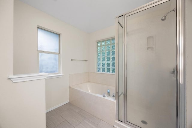 3817 Blue Mountain Path, Round Rock, TX 78681 - bathroom featuring a stall shower and a bath