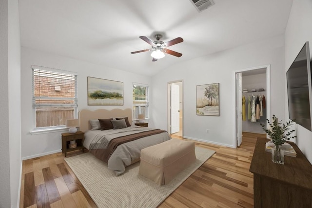 3817 Blue Mountain Path, Round Rock, TX 78681 - bedroom with a spacious closet, light wood-style floors, and ceiling fan