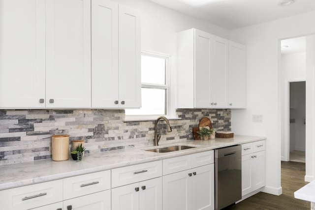 310 Shayla Ln, Canyon Lake, TX 78133 - kitchen with dishwasher, a sink, light stone counters, and white cabinets