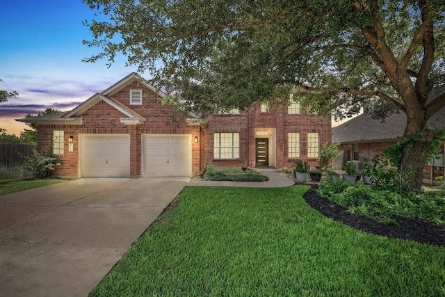 20420 Kearney Hill Rd, Pflugerville, TX 78660 - view of front of house with an attached garage, brick siding, and driveway
