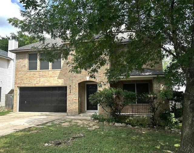 8429 Steamline Cir, Austin, TX 78745 - view of property hidden behind natural elements featuring brick siding, an attached garage, driveway, and roof with shingles