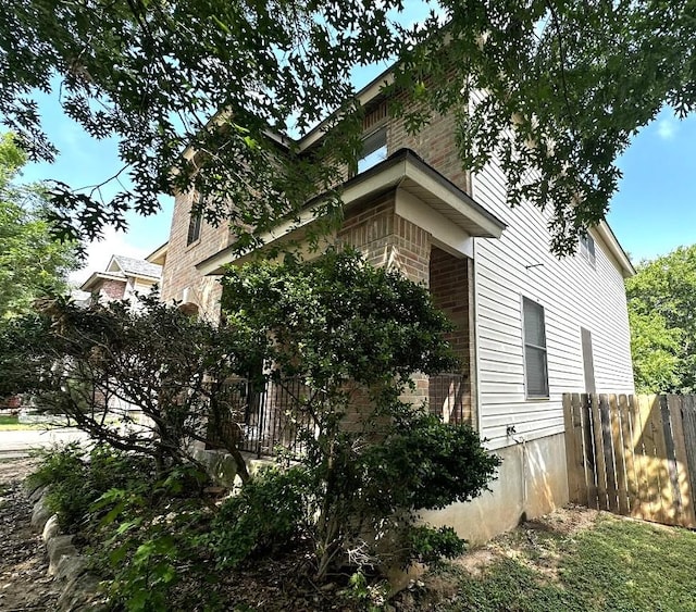 8429 Steamline Cir, Austin, TX 78745 - view of home's exterior featuring brick siding