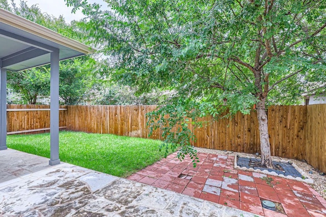 8521 White Ibis Dr, Austin, TX 78729 - fenced backyard with a patio
