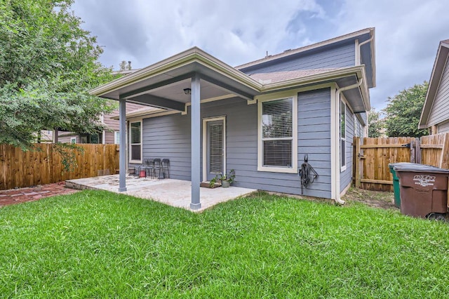 8521 White Ibis Dr, Austin, TX 78729 - rear view of property with a patio area