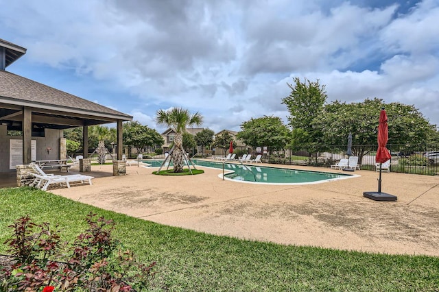 8521 White Ibis Dr, Austin, TX 78729 - community pool featuring a patio