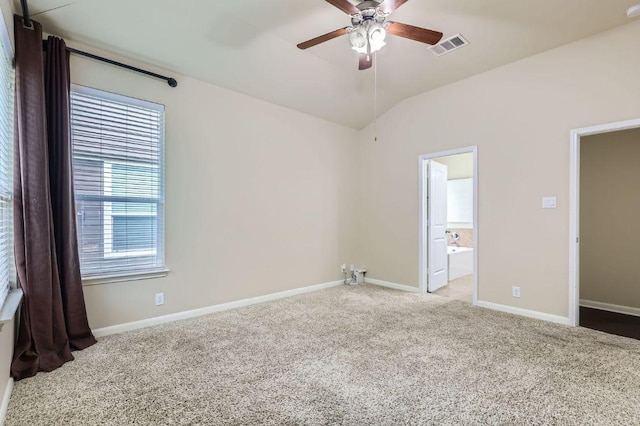 8521 White Ibis Dr, Austin, TX 78729 - empty room with carpet floors, ceiling fan, lofted ceiling, and a smoke detector