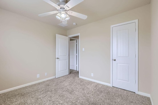 8521 White Ibis Dr, Austin, TX 78729 - unfurnished bedroom featuring carpet flooring and ceiling fan
