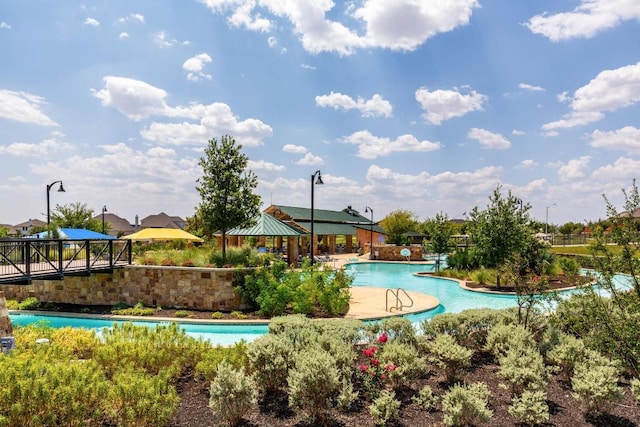 717 Sugar Cane Rd, Buda, TX 78610 - community pool with a gazebo and a patio area
