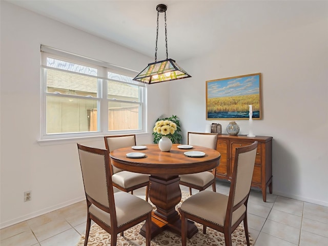 1705 W Braker Ln Unit A, Austin, TX 78758 - dining space featuring baseboards and light tile patterned floors