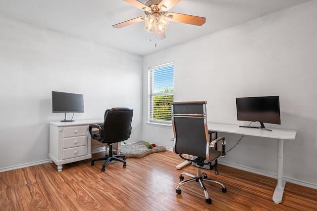 8936 Milton Lease Dr, Austin, TX 78747 - office area featuring wood finished floors, ceiling fan, and baseboards