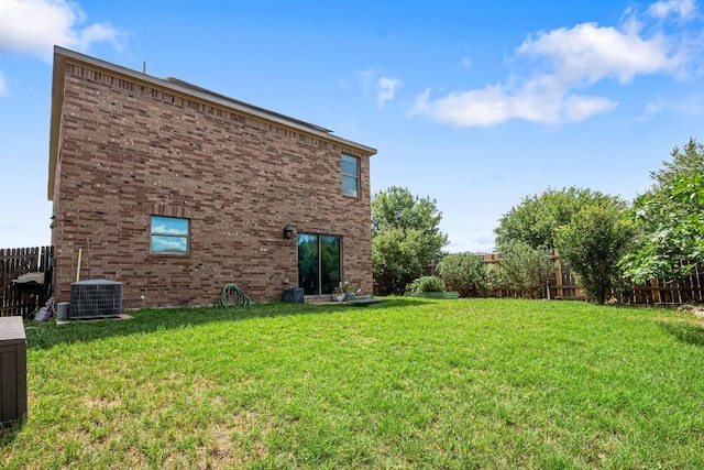 8936 Milton Lease Dr, Austin, TX 78747 - view of yard featuring central AC unit