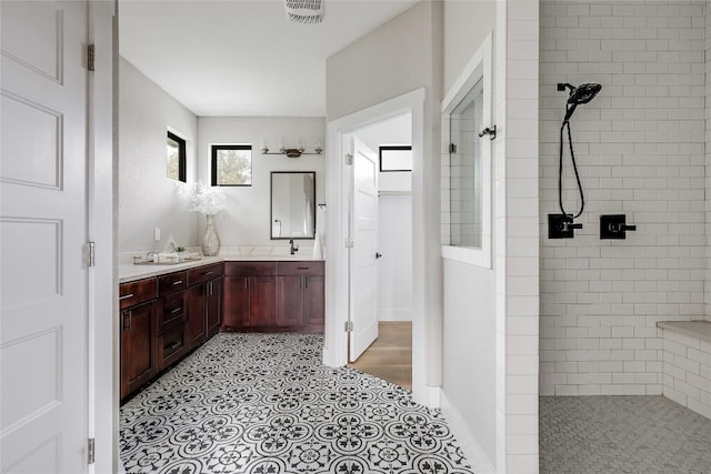 18700 Venture Dr, Point Venture, TX 78645 - full bath with a walk in shower and double vanity