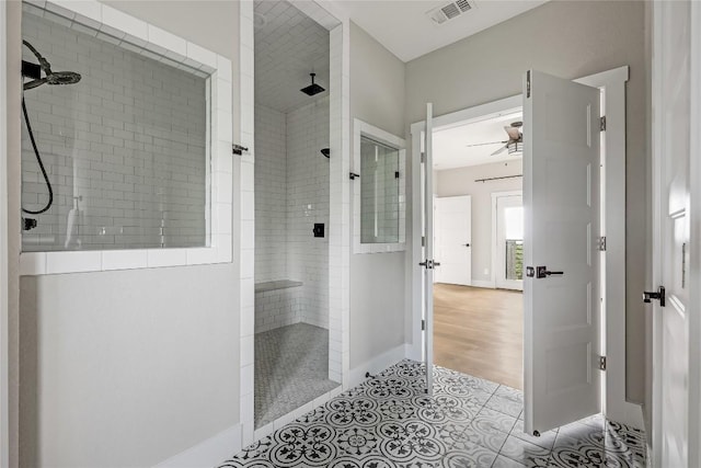 18700 Venture Dr, Point Venture, TX 78645 - full bathroom featuring walk in shower, a ceiling fan, and tile patterned flooring