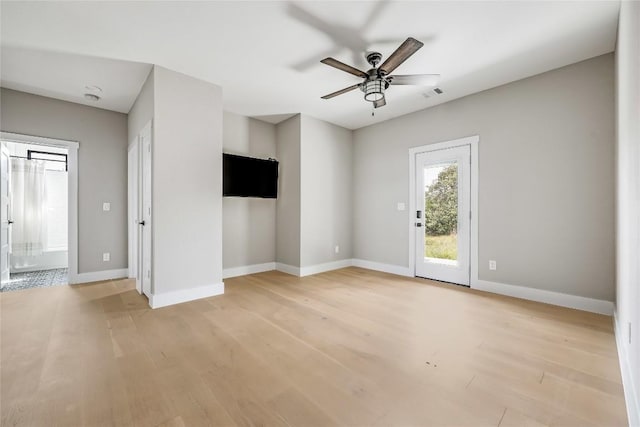 18700 Venture Dr, Point Venture, TX 78645 - unfurnished living room with a ceiling fan and light wood-style floors