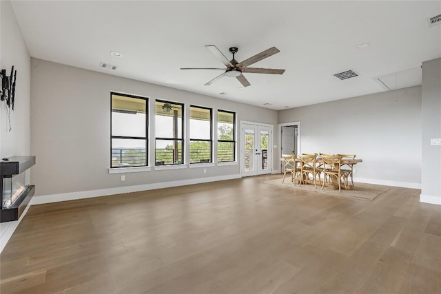 18700 Venture Dr, Point Venture, TX 78645 - living area with attic access, ceiling fan, and wood finished floors