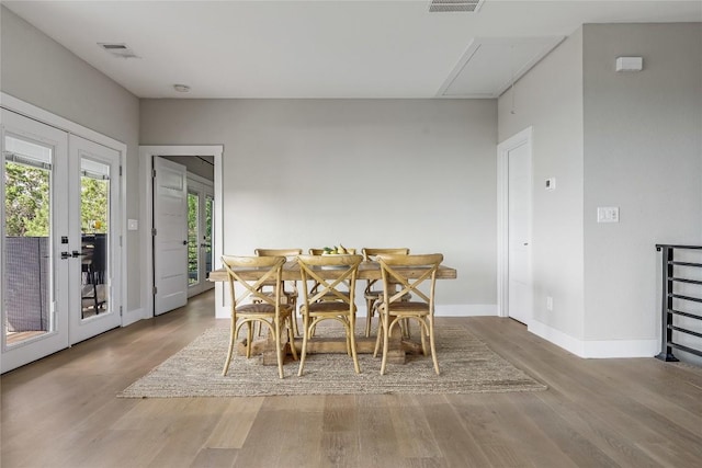 18700 Venture Dr, Point Venture, TX 78645 - dining room featuring wood finished floors and french doors