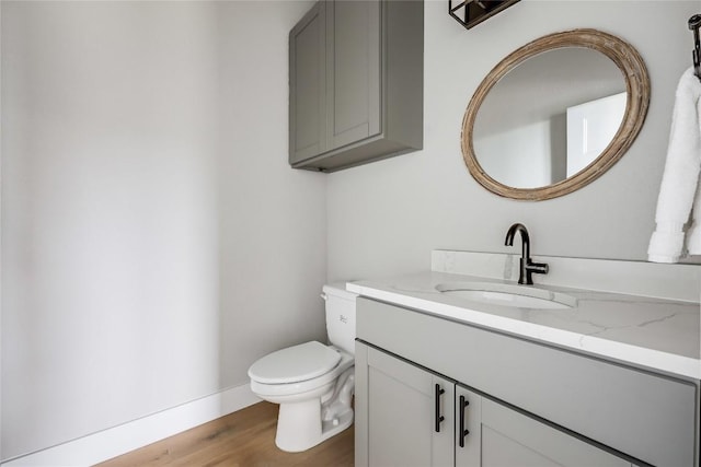 18700 Venture Dr, Point Venture, TX 78645 - half bathroom featuring vanity and wood finished floors