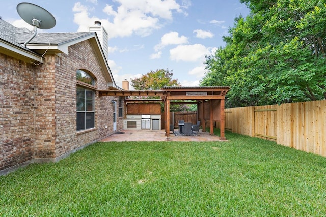 328 Palo Alto Way, Austin, TX 78732 - view of yard with an outdoor kitchen and a patio area