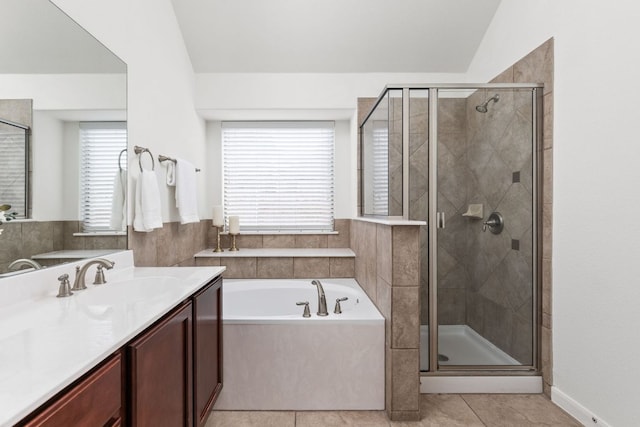 328 Palo Alto Way, Austin, TX 78732 - bathroom with vanity, a bath, a shower stall, and tile patterned flooring