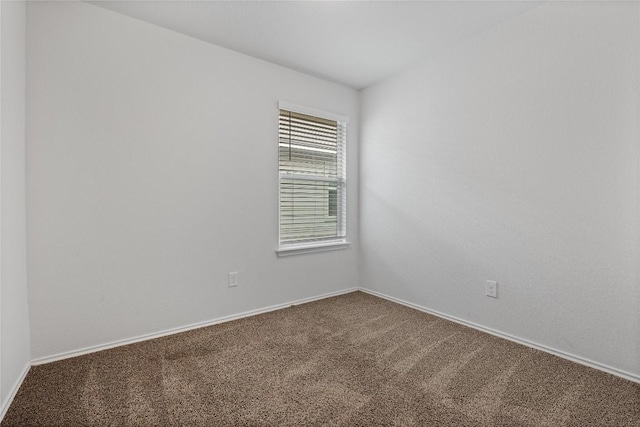 229 Reagor Dr, Taylor, TX 76574 - unfurnished room featuring carpet floors and baseboards
