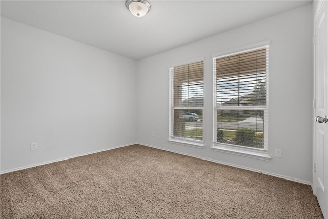 229 Reagor Dr, Taylor, TX 76574 - empty room with carpet and baseboards