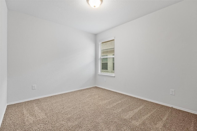 229 Reagor Dr, Taylor, TX 76574 - carpeted empty room featuring baseboards