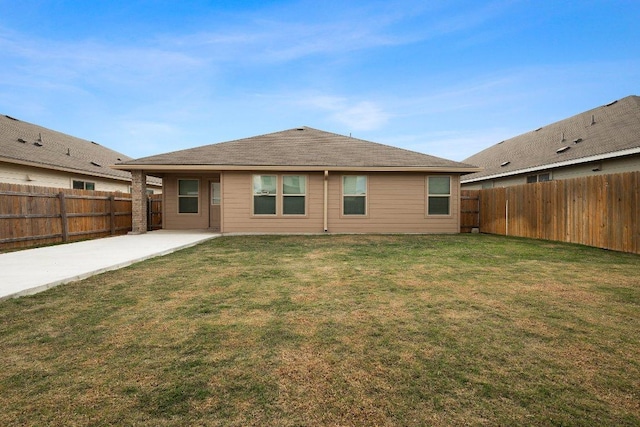 229 Reagor Dr, Taylor, TX 76574 - back of property with a patio area