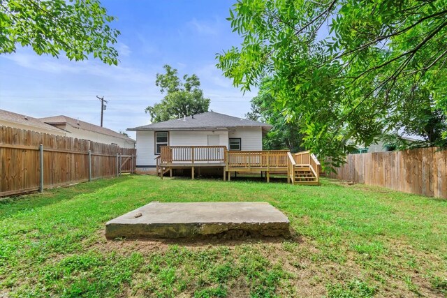204 E Brenham St, Elgin, TX 78621 - back of property featuring a patio area and a deck