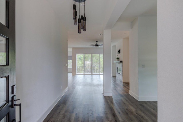 13401 Trail Driver, Austin, TX 78737 - corridor featuring wood finished floors and baseboards