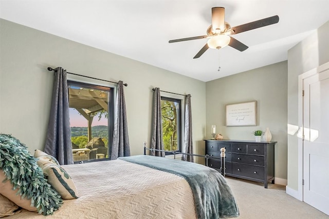 19407 White Horse Cv, Spicewood, TX 78669 - carpeted bedroom featuring ceiling fan and baseboards