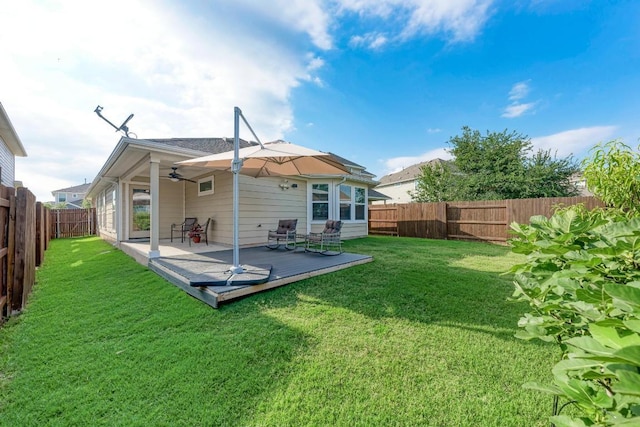 133 Free Stone Dr, Georgetown, TX 78628 - back of property featuring a ceiling fan and a wooden deck