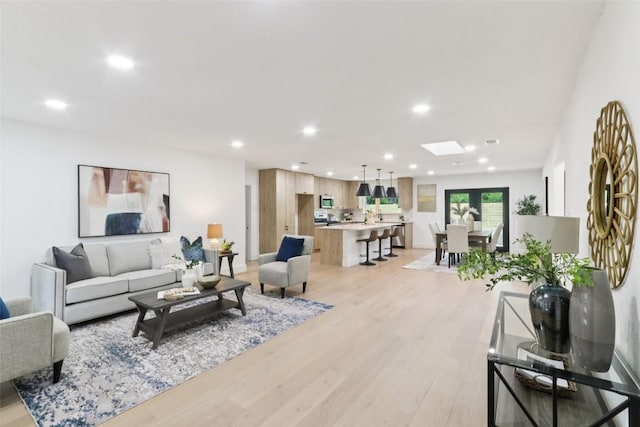 2322 Westoak Dr, Austin, TX 78704 - living room featuring recessed lighting and light wood-style floors