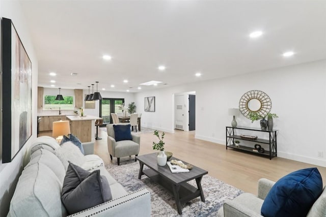 2322 Westoak Dr, Austin, TX 78704 - living area with recessed lighting and light wood-style floors