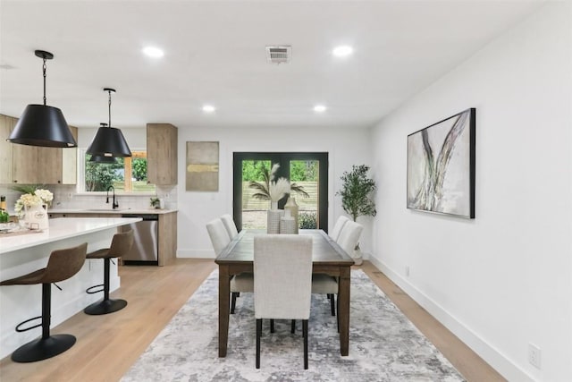 2322 Westoak Dr, Austin, TX 78704 - dining room with light wood-style flooring, recessed lighting, and plenty of natural light
