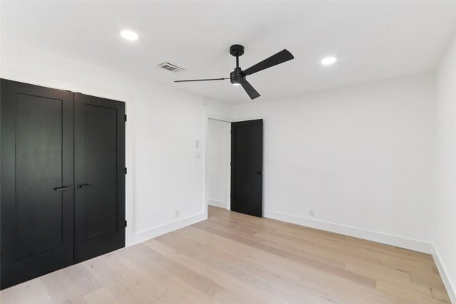 2322 Westoak Dr, Austin, TX 78704 - unfurnished bedroom featuring light wood-style floors, recessed lighting, a closet, and a ceiling fan