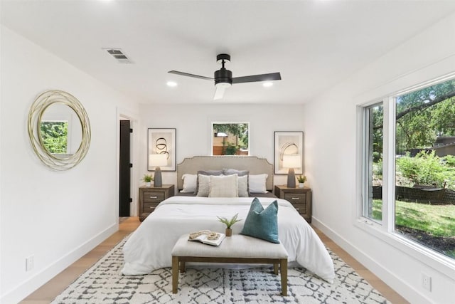 2322 Westoak Dr, Austin, TX 78704 - bedroom featuring multiple windows, ceiling fan, and recessed lighting
