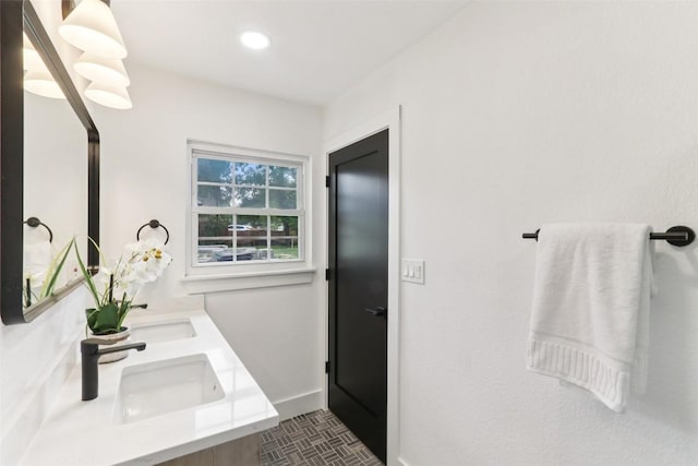 2322 Westoak Dr, Austin, TX 78704 - bathroom with double vanity and recessed lighting