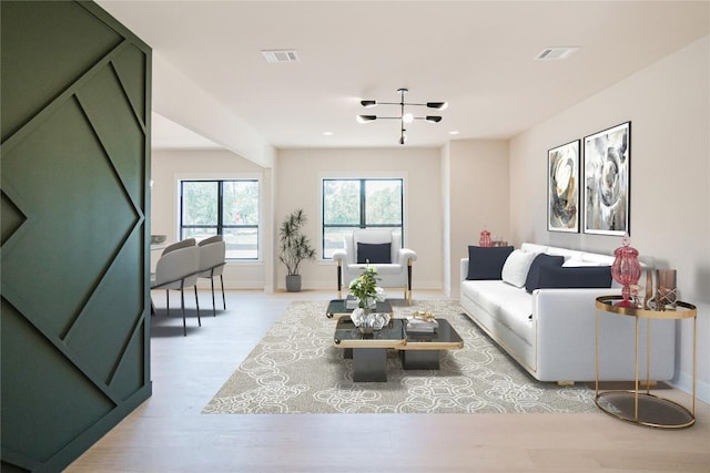 1201 Friends Cv, Round Rock, TX 78681 - living room with light wood-type flooring and recessed lighting