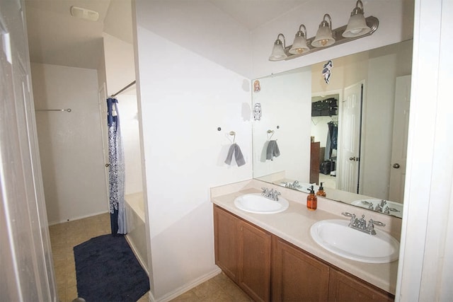 2723 Moonmist Cv, Round Rock, TX 78665 - bathroom featuring double vanity and shower / tub combo