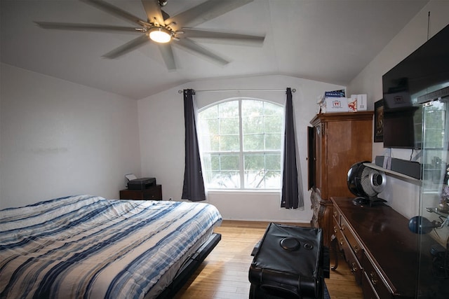 2723 Moonmist Cv, Round Rock, TX 78665 - bedroom featuring vaulted ceiling, light wood-type flooring, and a ceiling fan