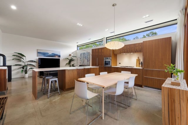 6506 Arroyo Seco, Austin, TX 78757 - dining room with finished concrete floors