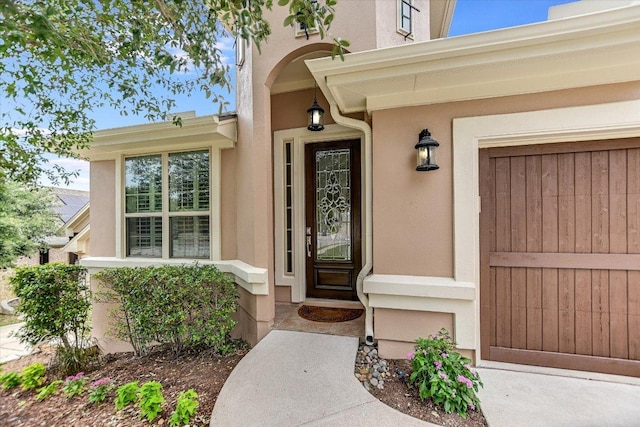 2416 Montello Ct, Leander, TX 78641 - view of exterior entry featuring stucco siding