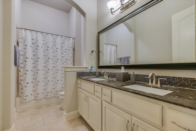 2416 Montello Ct, Leander, TX 78641 - bathroom featuring double vanity, shower / bathtub combination with curtain, and tile patterned floors