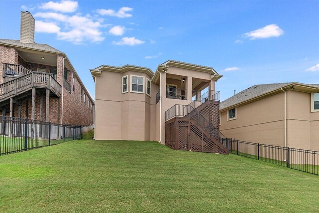 2416 Montello Ct, Leander, TX 78641 - rear view of property with a fenced backyard, stairs, stucco siding, and a balcony