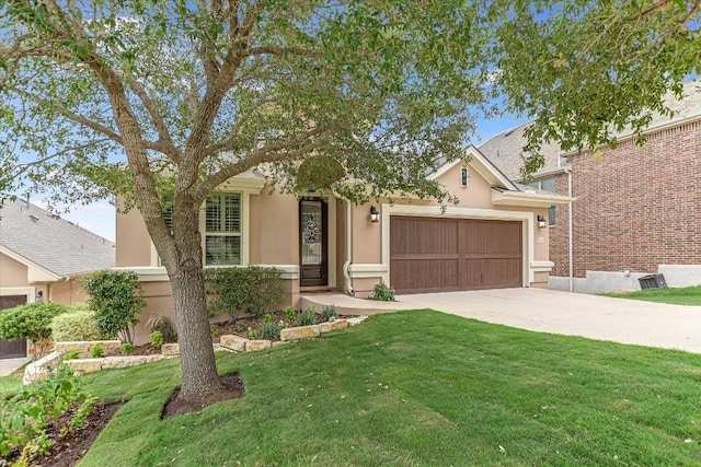 2416 Montello Ct, Leander, TX 78641 - obstructed view of property with stucco siding, driveway, a front yard, and an attached garage