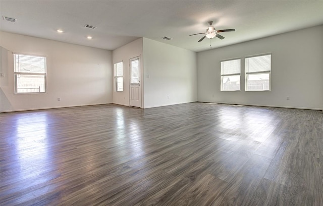 102 George Kimble Cv, Bastrop, TX 78602 - spare room with a ceiling fan, dark wood-type flooring, baseboards, and recessed lighting